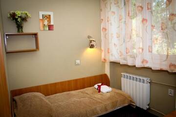 Фото номера Одноместный номер с собственной ванной комнатой Гостевой дом Ośrodek Usług Hotelarskich Kinga г. Величка 2