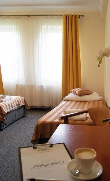 Фото номера Просторный двухместный номер с 2 отдельными кроватями Отель Hotel Salis г. Величка 7